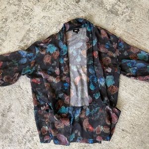 Floral light over shirt. Mid length sleeves
